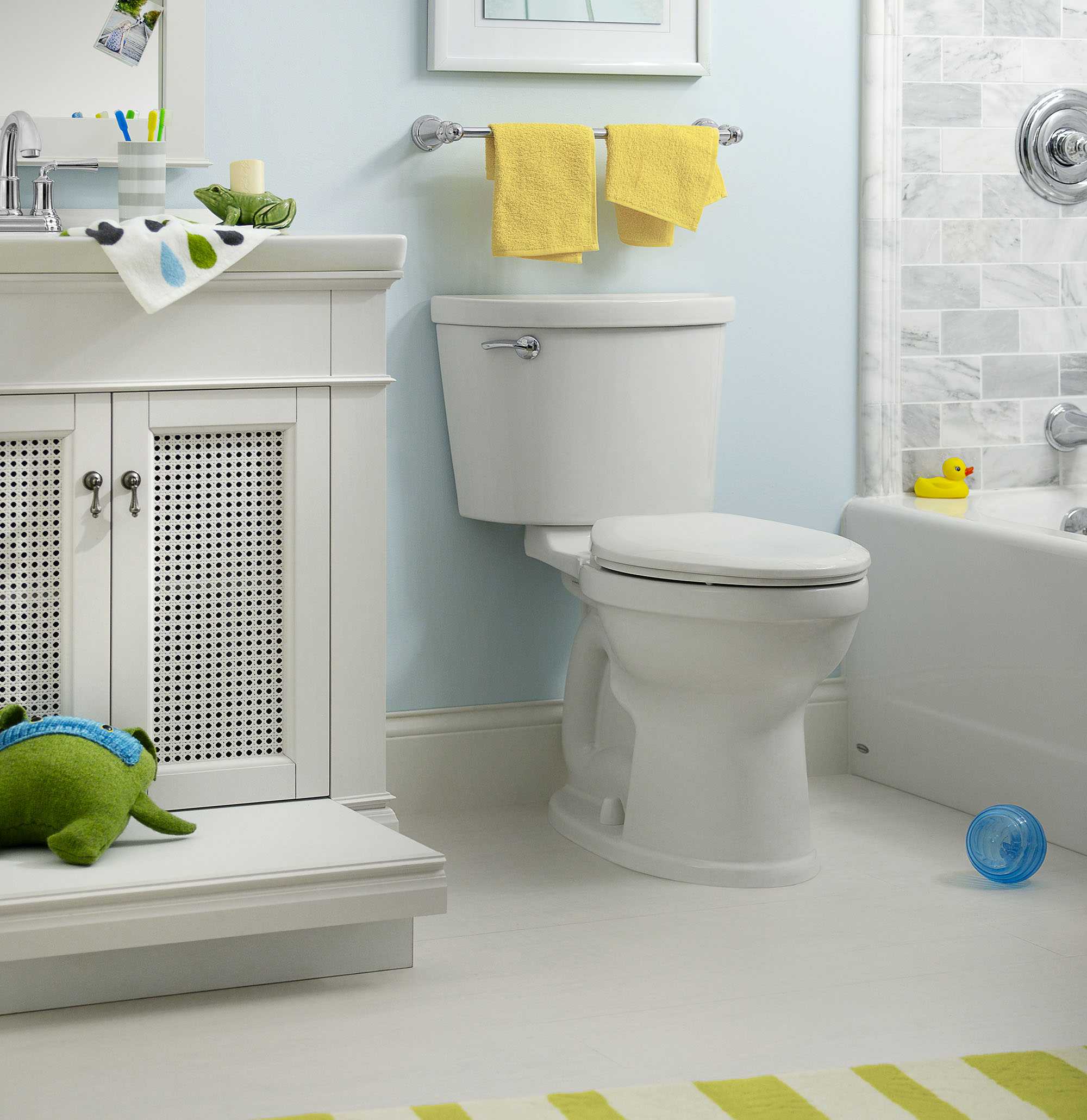 Champion PRO Two-Piece 1.28 gpf/4.8 Lpf Chair Height Elongated Toilet Less Seat